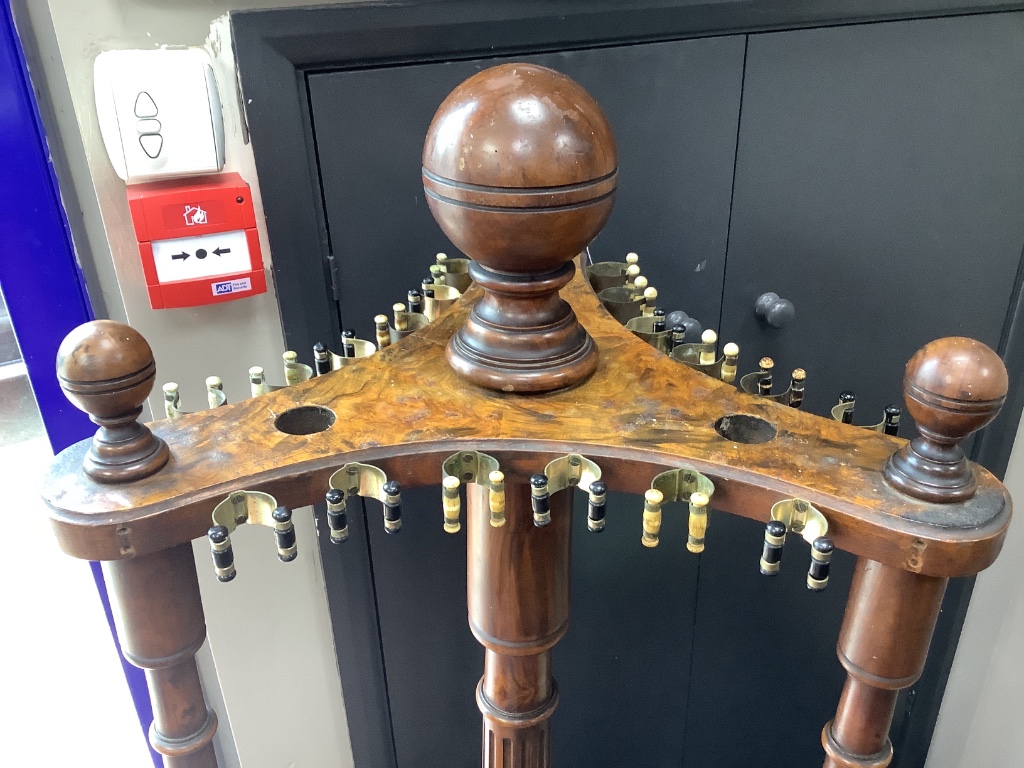 A Victorian walnut and burr walnut revolving billiard cue stand, diameter 56cm height 144cm